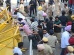 Protestors storming into Panjab University through Gate No. 1 on Monday. (Keshav Singh/HT) Protestors storming into Panjab University through Gate No. 1 on Monday. (Keshav Singh/HT)