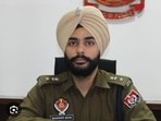The Punjab government on Saturday ordered the suspension of Amritsar Rural Police senior superintendent of police (SSP) Maninder Singh for his alleged failure to take action against gangsters. (HT Photo) The Punjab government on Saturday ordered the suspension of Amritsar Rural Police senior superintendent of police (SSP) Maninder Singh for his alleged failure to take action against gangsters. (HT Photo)