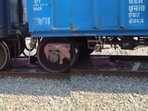 The video showed the man lying still on the platform as the train passed slowly over him. The video showed the man lying still on the platform as the train passed slowly over him.