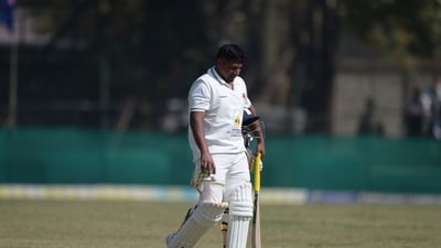 Sarfaraz Khan walks back to pavilion after getting out during Ranji Trophy match.