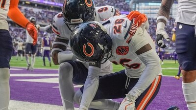 Chicago Bears cornerback Nahshon Wright honors ex-Laney College coach John Beam, who was recently killed in a shooting. (AP) Chicago Bears cornerback Nahshon Wright honors ex-Laney College coach John Beam, who was recently killed in a shooting. (AP)