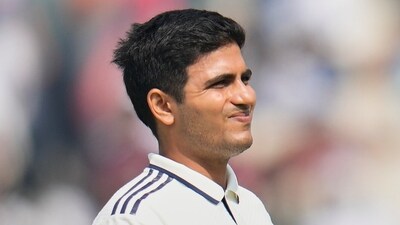 India's captain Shubman Gill reacts as he leaves the field after retired hurt on the second day of the first cricket test match between India and South Africa (AP)