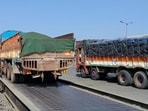 Despite the directive to check each and every heavy vehicle for overloading at the Khed-Shivapur toll naka, Hindustan Times observed that only a few heavy vehicles were being diverted to the weighing system installed near the toll gate. (HT PHOTO)