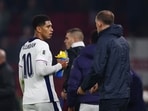 England manager Thomas Tuchel talks to Jude Bellingham.