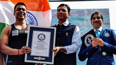 Union Health Minister Mansukh Mandaviya recently felicitated Rohtash Chaudhary aka Push-Up Man of India with a certificate, for performing 847 push-ups with a 60 lb (27.2 kg) weight on his back. (Photo: Atul Kumar Yadav/ANI)