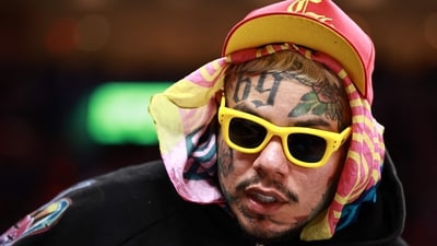 Tekashi 6ix9ine's mother was reportedly held at gunpoint during an armed break-in at their Florida home. (Photo by Carmen Mandato / GETTY IMAGES NORTH AMERICA / Getty Images via AFP) (Getty Images via AFP) Tekashi 6ix9ine's mother was reportedly held at gunpoint during an armed break-in at their Florida home. (Photo by Carmen Mandato / GETTY IMAGES NORTH AMERICA / Getty Images via AFP) (Getty Images via AFP)