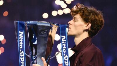 Italy's Jannik Sinner kisses the trophy after winning over Spain's Carlos Alcaraz at the end of the men's single final match at the ATP Finals. (AFP) Italy's Jannik Sinner kisses the trophy after winning over Spain's Carlos Alcaraz at the end of the men's single final match at the ATP Finals. (AFP)