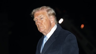 US President Donald Trump walks on the South Lawn of the White House. (Bloomberg) US President Donald Trump walks on the South Lawn of the White House. (Bloomberg)