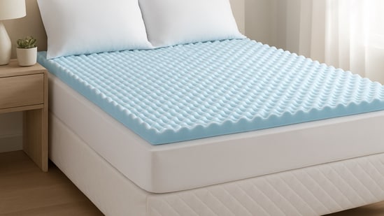 Upgrade your bed with these top-rated orthopaedic mattress toppers for comfort, spinal alignment, and a restful night’s sleep. (AI generated)
