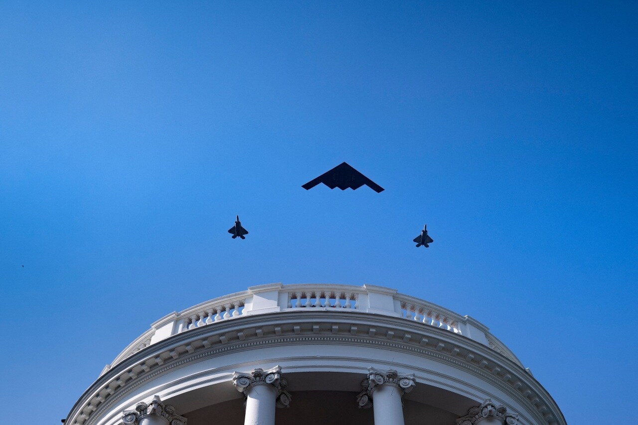 A U.S. stealth bomber, flanked by jet fighters, performed a flyover at the White House on July 4. A U.S. stealth bomber, flanked by jet fighters, performed a flyover at the White House on July 4.