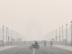 New Delhi, Nov 18 (ANI): A man rides his motorcycle at Kartavya Path amid dense smog as the air quality remains poor, in New Delhi on Tuesday. (ANI Photo/Ankit Tyagi)