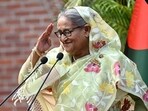 Bangladesh's then Prime Minister Sheikh Hasina accepts the greetings from the assembled media and election observers while addressing a press conference, a day after she won the 12th parliamentary elections, in Dhaka on January 8, 2024. (AFP)
