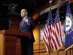 US House Minority Leader Hakeem Jeffries (D-NY) speaks to reporters at a news conference inside the U.S. Capitol on November 17.