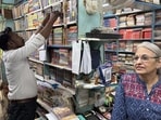 The one in Shankar Market continues to remain a lending library. This afternoon, the owner, the genial Manjula Sharma, is pacing inside her library, crammed with thousands of old paperbacks. (HT Photo)