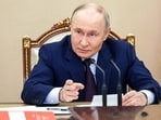 Russian President Vladimir Putin chairs a meeting with members of the Security Council in Moscow, Russia, November 5, 2025.