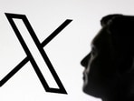 A 3D-printed miniature model of Elon Musk and the X logo are seen in this illustration. REUTERS/Dado Ruvic/Illustration/File Photo