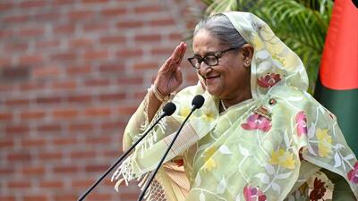 Bangladesh's then Prime Minister Sheikh Hasina accepts the greetings from the assembled media and election observers while addressing a press conference, a day after she won the 12th parliamentary elections, in Dhaka on January 8, 2024. (AFP) Bangladesh's then Prime Minister Sheikh Hasina accepts the greetings from the assembled media and election observers while addressing a press conference, a day after she won the 12th parliamentary elections, in Dhaka on January 8, 2024. (AFP)