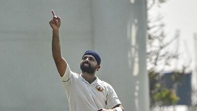 Chandigarh's captain Manan Vohra celebrates his century during the third day of the Ranji Trophy match against Karnataka. (PTI)