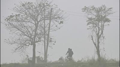 Dense fog and low visibility on a cold winter morning on Tuesday. (PTI) Dense fog and low visibility on a cold winter morning on Tuesday. (PTI)
