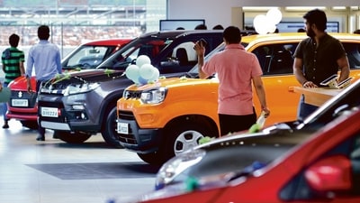 File photo of Maruti Suzuki cars inside a showroom. (HT) File photo of Maruti Suzuki cars inside a showroom. (HT)