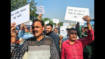 People protest against state cooperative agriculture and rural development bank for withholding matured fixed deposits, in Jammu on Tuesday. (ANI) People protest against state cooperative agriculture and rural development bank for withholding matured fixed deposits, in Jammu on Tuesday. (ANI)
