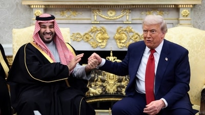 Donald Trump and Saudi Crown Prince and Prime Minister Mohammed bin Salman hold hands during a meeting in the Oval Office at the White House in Washington, D.C., U.S., November 18, 2025 (REUTERS)