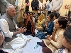 Punjab BJP chief Sunil Jakhar with family members of RSS worker Naveen Arora. Punjab BJP chief Sunil Jakhar with family members of RSS worker Naveen Arora.