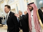 Elon Musk (left) and Nvidia CEO Jensen Huang (centre) are directed to greet the Saudi Crown Prince at the Royal Court in Riyadh on 13 May 2025.