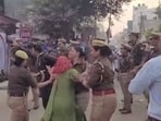 The suspensions were ordered days after the 30-year-old survivor, in a desperate bid for justice, pushed past nine policemen and threw herself in front of the moving car of Meerut Range DIG Kalanidhi Naithani outside Khurja police station last Thursday (Sourced) The suspensions were ordered days after the 30-year-old survivor, in a desperate bid for justice, pushed past nine policemen and threw herself in front of the moving car of Meerut Range DIG Kalanidhi Naithani outside Khurja police station last Thursday (Sourced)