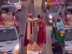 In the clip, the groom, dressed in a cream sherwani, is seen placing a garland around the bride. (Instagram)