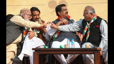 (Right) Jammu and Kashmir Congress president Tariq Hameed Karra with AICC in-charge of J&K and Ladakh Syed Naseer Hussain and party leader Ghulam Ahmad Mir during an event to mark former Prime Minister Indira Gandhi's birth anniversary, in Jammu, on Wednesday. (PTI) (Right) Jammu and Kashmir Congress president Tariq Hameed Karra with AICC in-charge of J&K and Ladakh Syed Naseer Hussain and party leader Ghulam Ahmad Mir during an event to mark former Prime Minister Indira Gandhi's birth anniversary, in Jammu, on Wednesday. (PTI)