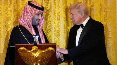 President Donald Trump shakes hands with Saudi Arabia's Crown Prince Mohammed bin Salman during a dinner in the East Room of the White House, Tuesday, Nov. 18, 2025, in Washington. AP/PTI(AP11_19_2025_000001B) (AP)