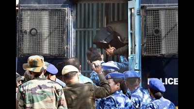 Amir Rashid Mir being taken to Patiala House Courts on Monday. (Arvind Yadav/HT) Amir Rashid Mir being taken to Patiala House Courts on Monday. (Arvind Yadav/HT)