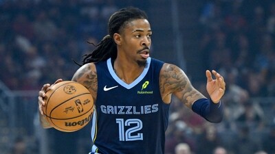 Memphis Grizzlies guard Ja Morant (12) is recovering from a Grade 1 strain of his right calf. (IMAGN IMAGES via Reuters Connect)