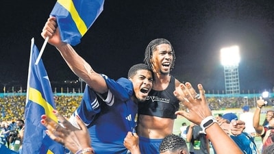 Curacao players and fans celebrate after a 0-0 draw with Jamaica confirmed their spot at the 2026 World Cup. (AFP) Curacao players and fans celebrate after a 0-0 draw with Jamaica confirmed their spot at the 2026 World Cup. (AFP)