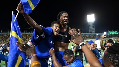 Curacao players and fans celebrate World Cup 2026 qualification after a 0-0 draw with Jamaica (AFP) Curacao players and fans celebrate World Cup 2026 qualification after a 0-0 draw with Jamaica (AFP)