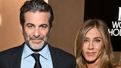 Jennifer Aniston makes her public appearance with BF Jim Curtis Jennifer Aniston makes her public appearance with BF Jim Curtis