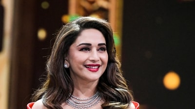 Actor Madhuri Dixit shared a 20-second teaser of her new show Mrs Deshpande where she showcases her as a serial killer. (PTI) Actor Madhuri Dixit shared a 20-second teaser of her new show Mrs Deshpande where she showcases her as a serial killer. (PTI)
