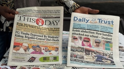 A vendor display local newspapers on the street of Lagos with headlines of the Government Girls Comprehensive Secondary School. (AP Photo/Sunday Alamba ) (AP) A vendor display local newspapers on the street of Lagos with headlines of the Government Girls Comprehensive Secondary School. (AP Photo/Sunday Alamba ) (AP)