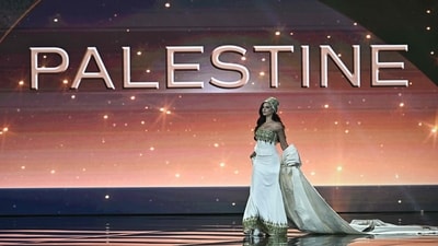 Miss Palestine Nadeen Ayoub walks on stage. (AFP) Miss Palestine Nadeen Ayoub walks on stage. (AFP)