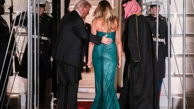 US President Donald Trump, from left, First Lady Melania Trump, and Mohammed bin Salman, Saudi Arabia's crown prince, during a ceremony at the South Portico of the White House in Washington, DC, US, on Tuesday, Nov. 18, 2025. Trump said the US would sell F-35 fighter jets to Saudi Arabia, offering Crown Prince Mohammed bin Salman a prize he�s long cherished - even though many obstacles remain before he gets the stealthy planes. Photographer: Nathan Howard/Politico/Bloomberg (Bloomberg) US President Donald Trump, from left, First Lady Melania Trump, and Mohammed bin Salman, Saudi Arabia's crown prince, during a ceremony at the South Portico of the White House in Washington, DC, US, on Tuesday, Nov. 18, 2025. Trump said the US would sell F-35 fighter jets to Saudi Arabia, offering Crown Prince Mohammed bin Salman a prize he�s long cherished - even though many obstacles remain before he gets the stealthy planes. Photographer: Nathan Howard/Politico/Bloomberg (Bloomberg)