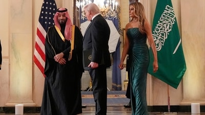 President Donald Trump, first lady Melania Trump and Saudi Arabia's Crown Prince Mohammed bin Salman arrive through the Blue Room for a dinner in the East Room of the White House, Tuesday, Nov. 18, 2025, in Washington. (AP Photo/Alex Brandon) (AP) President Donald Trump, first lady Melania Trump and Saudi Arabia's Crown Prince Mohammed bin Salman arrive through the Blue Room for a dinner in the East Room of the White House, Tuesday, Nov. 18, 2025, in Washington. (AP Photo/Alex Brandon) (AP)