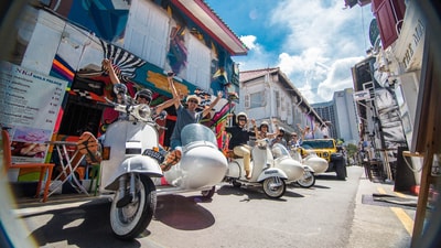 Experience a vintage sidecar ride through vibrant neighborhoods, passing iconic spots like Geylang and Chinatown. Experience a vintage sidecar ride through vibrant neighborhoods, passing iconic spots like Geylang and Chinatown.