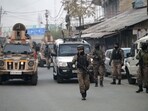 Paramilitary soldiers patrol near the Nowgam police station after an accidental explosion on the outskirts of Srinagar. (Photo By Waseem Andrabi /Hindustan Times)