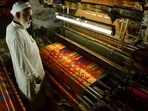 A weaver in Varanasi. Anil Yadav’s short story, Lord Almighty, Grant Us Riots!, is about the suffering of Muslim weavers in Mominpur, a Varanasi ghetto. (Shutterstock)