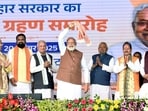 Prime Minister Narendra Modi seen waving his 'gamcha' during the swearing-in ceremony of the NDA government in Patna, Bihar, on Thursday. Prime Minister Narendra Modi seen waving his 'gamcha' during the swearing-in ceremony of the NDA government in Patna, Bihar, on Thursday.