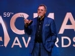 Vince Gill receives the Lifetime Achievement award at the 59th Annual Country Music Association Awards in Nashville.(REUTERS)