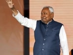 Patna: JD(U) supremo Nitish Kumar waves to the gathering during his swearing-in ceremony as the Chief Minister of Bihar. Patna: JD(U) supremo Nitish Kumar waves to the gathering during his swearing-in ceremony as the Chief Minister of Bihar.