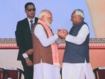 Screengrab showing Prime Minister Narendra Modi being greeted by Nitish Kumar after taking oath as the Chief Minister of Bihar.