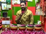 Syed Shahnawaz is manning the rose stall at the historic Sufi shrine of Hazrat Sarmad Shahid in Old Delhi. (HT)